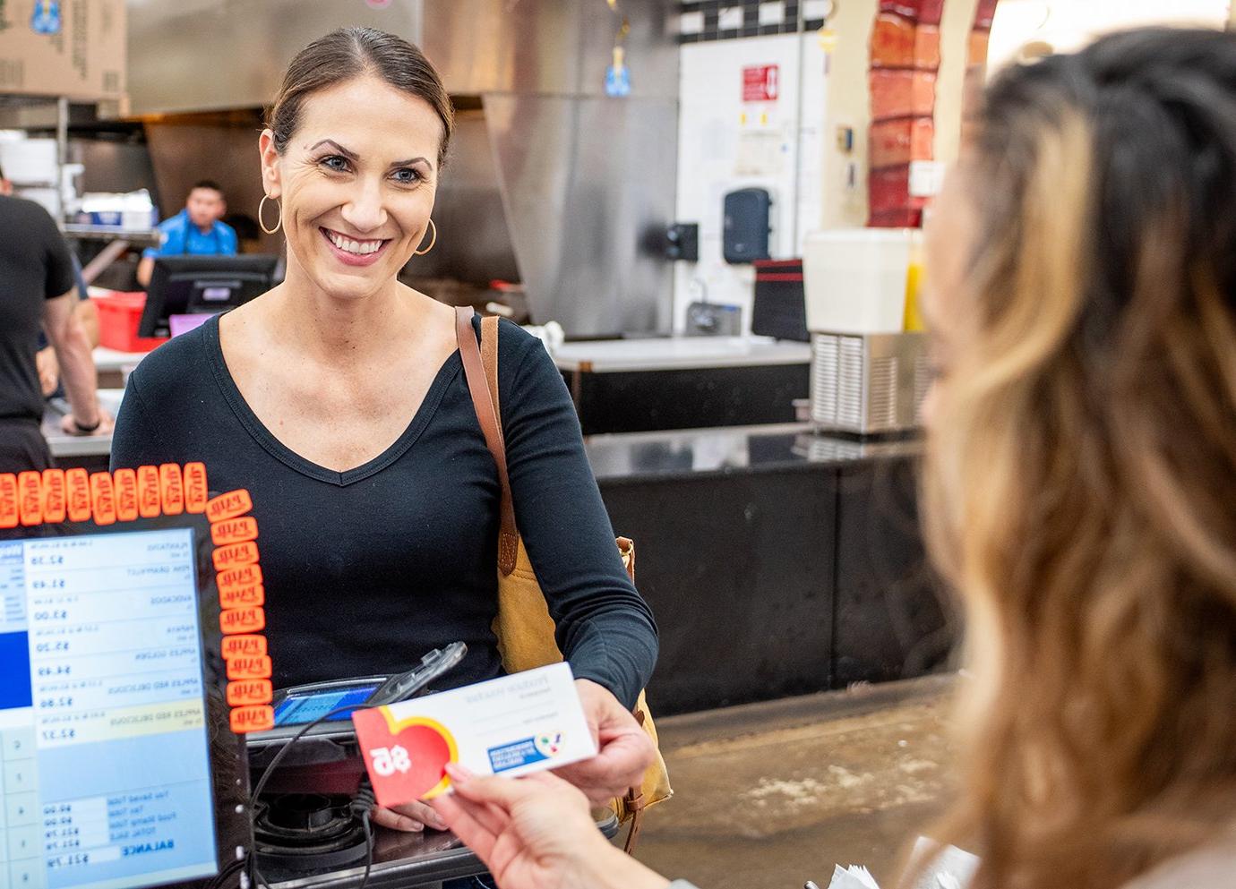 A person at a cash register